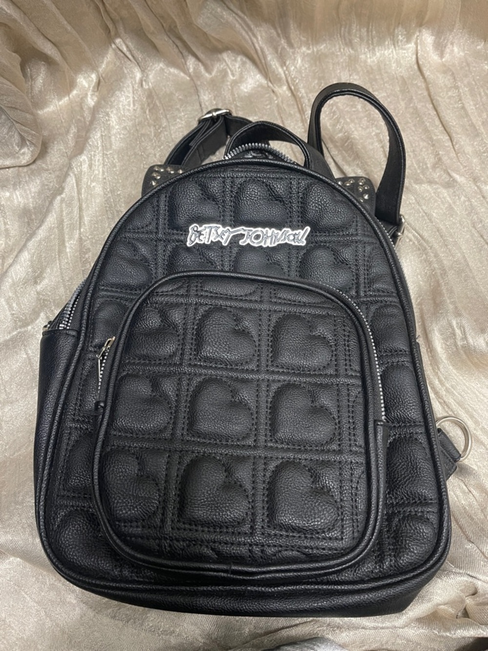 Betsey Johnson Black Quilted Heart Cat Ear Backpack with Silver Logo